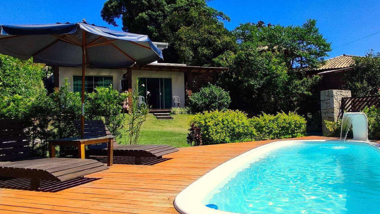 Pousada Morada Madu Flat Charmoso com Piscina no Centrinho do Rosa in Imbituba, Brasil
