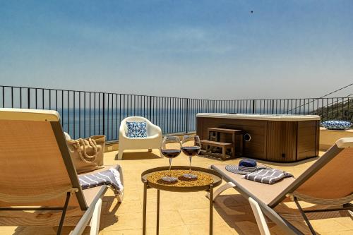 Suite Karola Exclusive Stay — 4-Star Luxury Hotel in Acireale, Italy