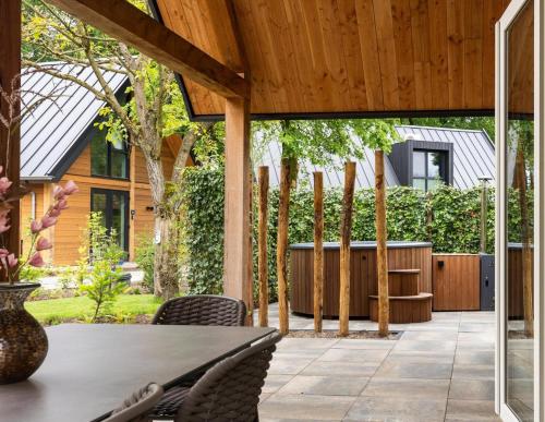 Bos Villa met Hottub 6 personen Resort Valley — hotel in Wekerom