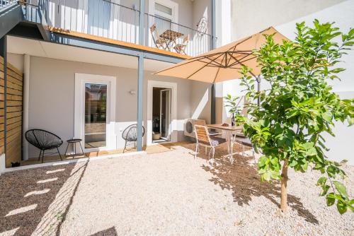 Wood Wall & Garden Apartment — 4-Star Luxury Hotel in Lisbon, Portugal