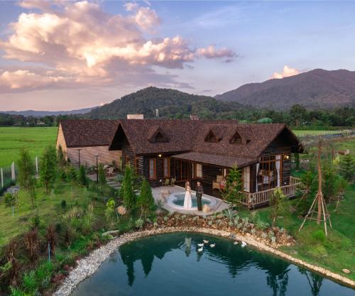 Pine Village CNX — 4-Star Luxury Hotel in Chiang Mai, Thailand