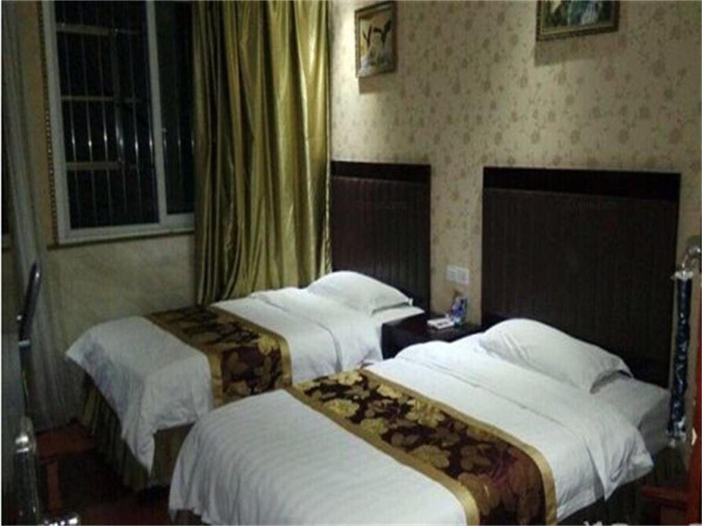 Yixin Business Hotel — hotel in Guang'an