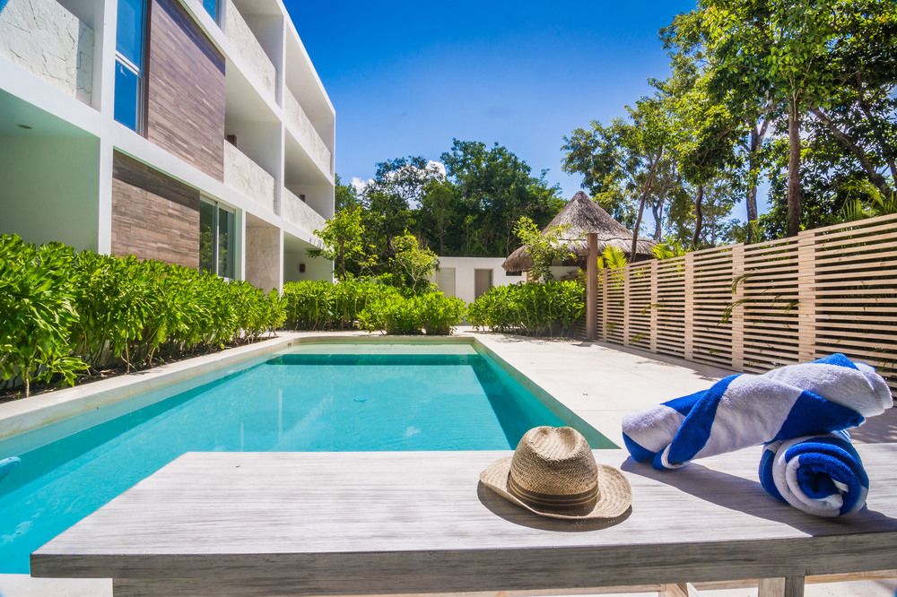 Sammati Village — 4-Star Luxury Hotel in Tulum, Mexico