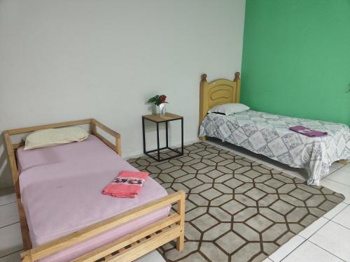 Pousada Soluar quarto triplo in Cianorte, Brasil