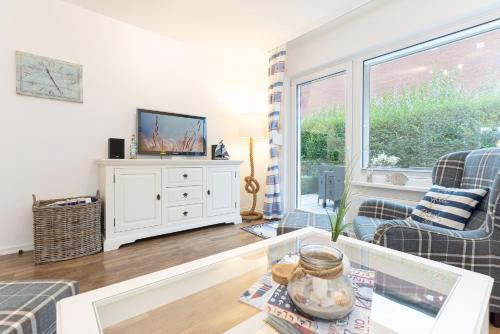 Ferienhaus Käptn&#039s Hus 120 qm Weidenweg 1 APPARTO Grömitz in Gromitz, Germany