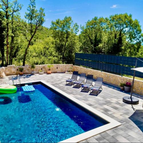 Luxury Villa Andrea Vrzika in forest near the sea with heated pool — 4-Star Luxury Hotel in Zagvozd, Croatia