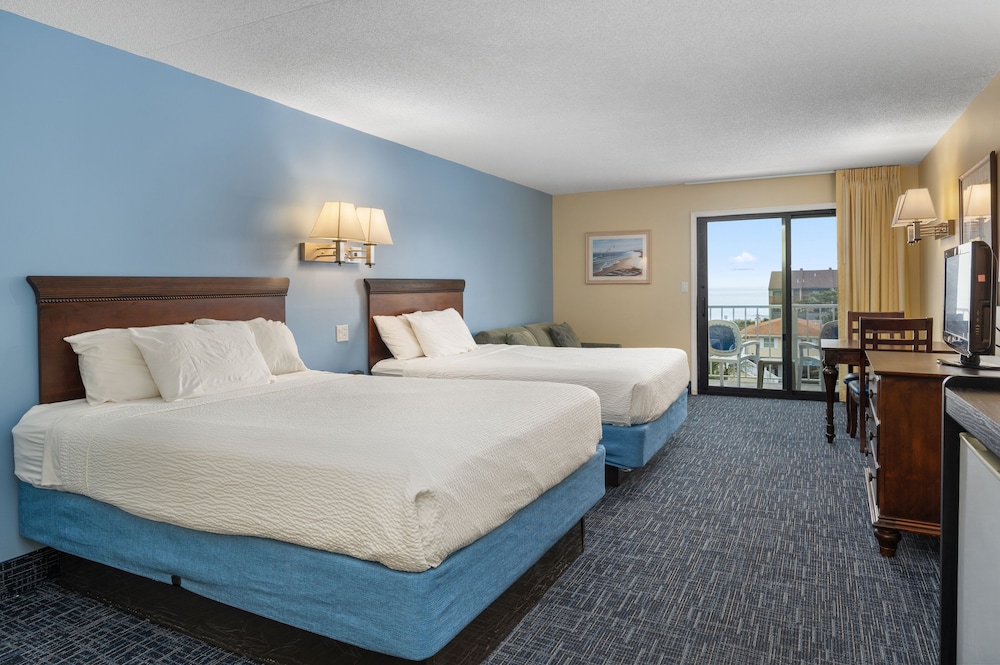 Coastal Palms Inn & Suites - photo 11