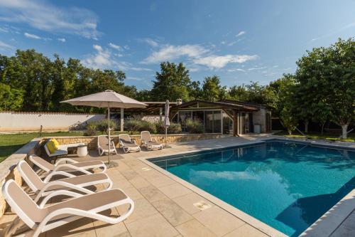 Family friendly house with a swimming pool Lovrecica Umag 22979 — 4-Star Luxury Hotel in Umag, Croatia