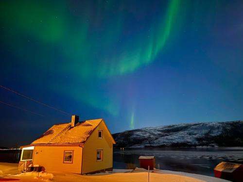 Senja Botnhamn - carbon neutral hotel in Unknown City