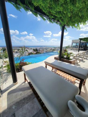 Fabulosa vista al mar desde la piscina infinita — 4-Star Luxury Hotel in Playa Del Carmen, Mexico
