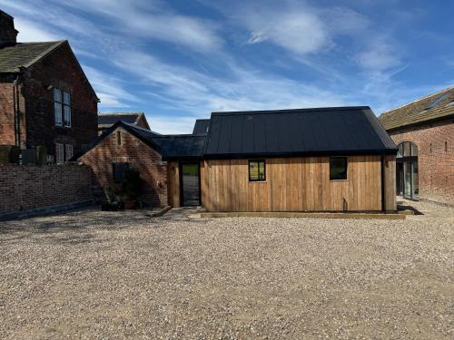 The Stables Modern 2 bed 4 person Rural Barn Conversion with Great Access — 4-Star Luxury Hotel in Silkstone, United Kingdom