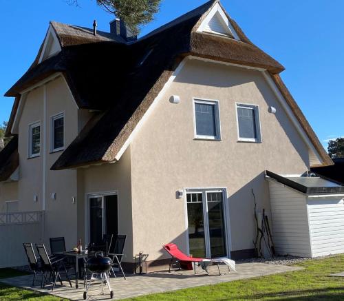 Ferienhaus Reet Traum - carbon neutral hotel in Unknown City
