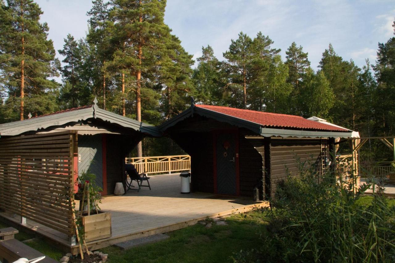 Timber cottages with jacuzzi and sauna near lake Vänern in Karlstad, Sweden