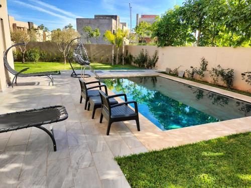 Villa piscine privée Détente familiale Marrakech — 4-Star Luxury Hotel in Marrakesh, Morocco