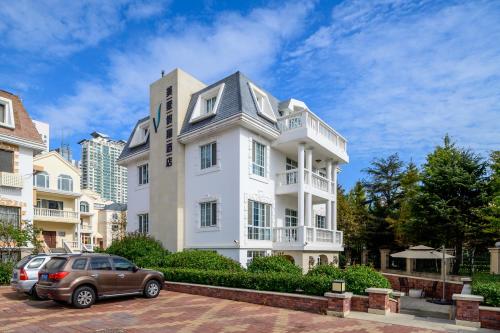 Qingdao Villa Inn No 12 Seaside Wusi Suqare — 4-Star Luxury Hotel in Qingdao, People's Republic of China