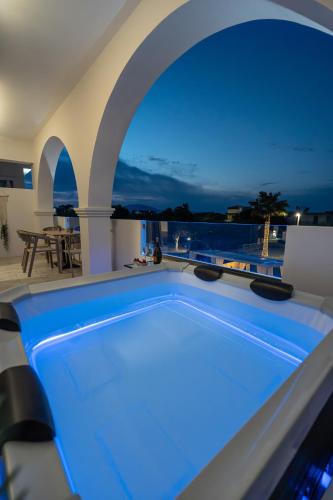 Mamfredas Suites — 4-Star Luxury Hotel in Kipseli, Greece