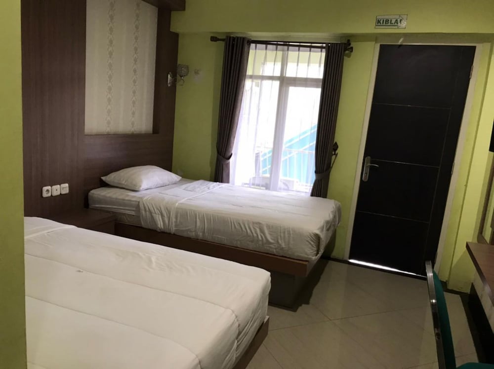 Grand Balqis Akasia Hotel by ZUZU in Surabaya, Indonesia