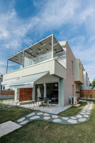 Aegean Twin Houses in Unknown City, Greece