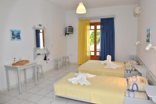 Theoni Studios — 4-Star Luxury Hotel in Kastraki, Greece