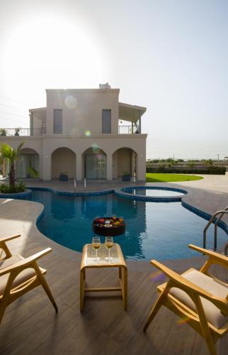 Villa Fiorita Stunning Mediterranean Style 3 BHK Villa With Outdoor Pool Bar & Hill Views — 4-Star Luxury Hotel in Jaipur, India