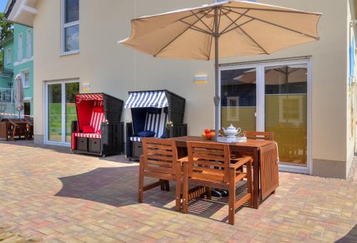 Haus Strandkörv mit Fass Sauna — 4-Star Luxury Hotel in Loddin, Germany