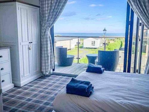 Sea view The Lookout at The Bay holiday village Filey 2 bed sleeps 5 dog friendly free leisure facilities direct beach access pub and shop click to view photos