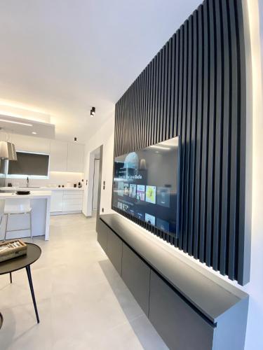 Seafront Apartment by C2C Architects — 4-Star Luxury Hotel in Kalyvia Thorikou, Greece