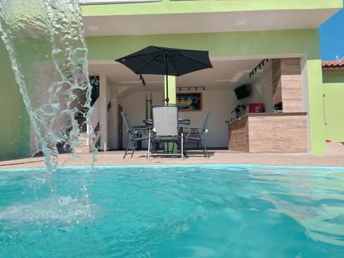 Espaço Alvorada com Banheira agendamento das atividades café da manhã no centro in Brotas, Brasil