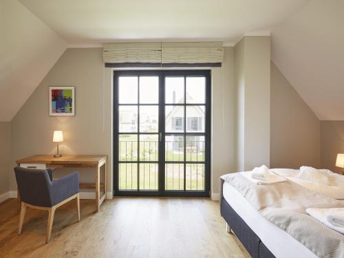 Reetland am Meer Premium Reetdachvilla mit 3 Schlafzimmern Sauna und Kamin F09 in Dranske, Germany