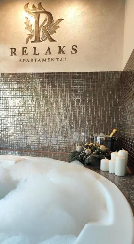 Jacuzzi Apartamentai Relaks — 4-Star Luxury Hotel in Klaipeda, Lithuania