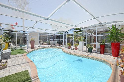 Arum Field Accommodation - carbon neutral hotel in Cape Town