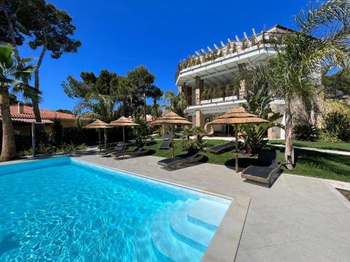 Suite Villa Domos & SPA — 4-Star Luxury Hotel in Sant'anna Arresi, Italy