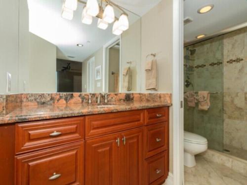 Deluxe Beachfront Condo Located in Prestigious Resort with Pool and Hot Tub by RedAwning - photo 9