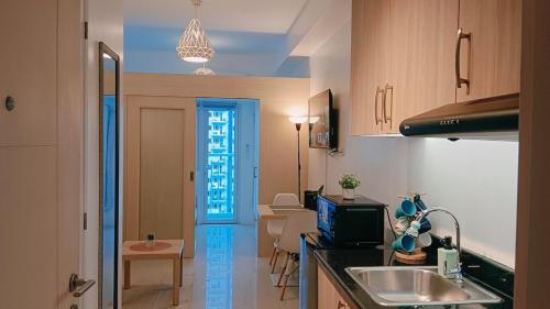 1BR Condotel with Balcony at SM Light Residences #LT04 1 — 4-Star Luxury Hotel in Manila, Philippines