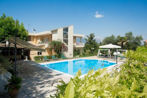 Tranquil Apartments Corfu — 4-Star Luxury Hotel in Kontokali, Greece