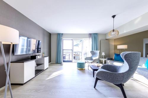 Moderne Ferienwohnung Ostseelounge mit Süd Westbalkon und eigener Infrarotkabine — 4-Star Luxury Hotel in Wustrow, Germany