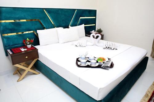 Royalton Inn Hotel Gulberg - carbon neutral hotel in Lahore
