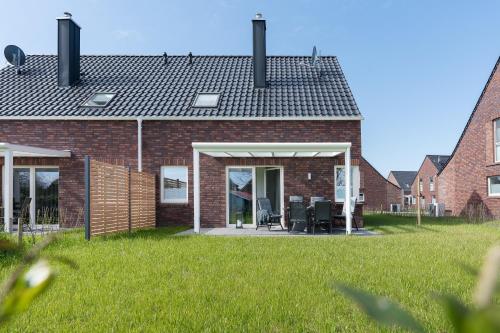 Meerperle Sauna und überdachte Terrasse Hunde willkommen - carbon neutral hotel in Unknown City