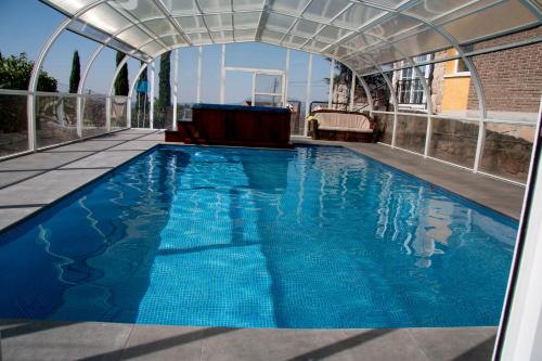 Casa Rural Collarubio — 4-Star Luxury Hotel in Collado Mediano, Spain