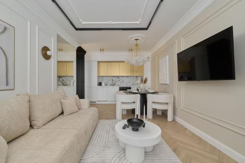 Luxurious 13th Floor Beige Apartment in Wrocław with Furnished Balcony by Renters Prestige — 4-Star Luxury Hotel in Wroclaw, Poland