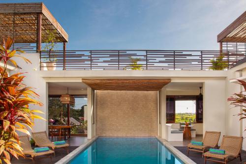 Villa Melko Stylish 4BR Villa with Pool & Rooftop Lounge — 4-Star Luxury Hotel in Canggu, Indonesia
