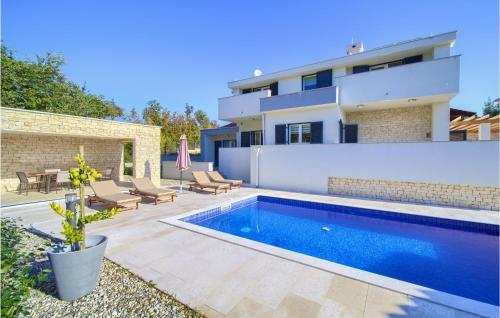 3 Bedroom Nice Home In Risika — 5-Star Luxury Hotel in Vrbnik, Croatia