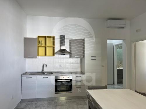 Bilocale Arion Spiaggia a 10 m By Cala Salento — 4-Star Luxury Hotel in Porto Cesareo, Italy