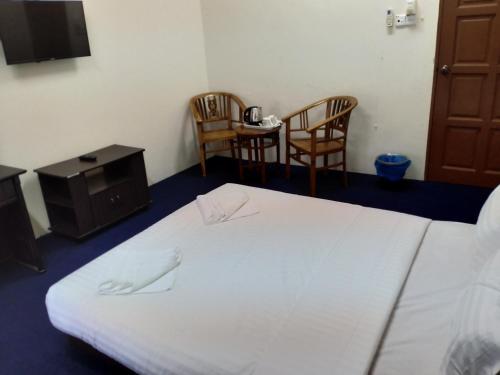 Hotel Maidam Inn — Jertih — photo 4