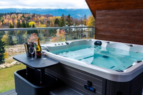Aparts4U Kras Resort Apartament B307 z prywatnym jacuzzi antresolą i widokiem na góry in Szklarska Poreba, Poland
