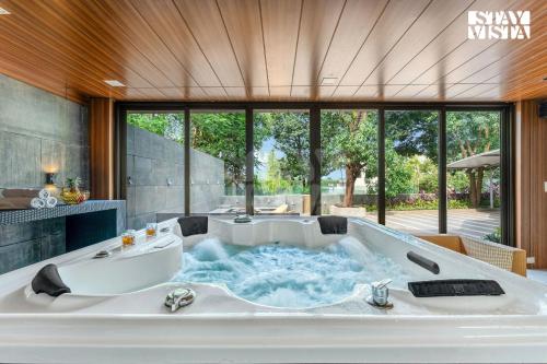 StayVista at Enclave of Bliss with Jacuzzi & BBQ Grill — hotel in Murbad
