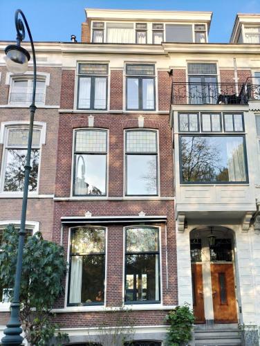 Historic canal house in green residential area