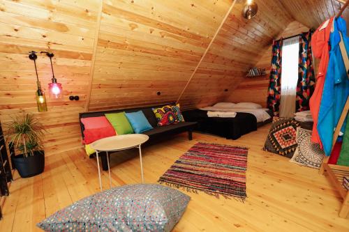 Wooden cottage green house in Bakuriani