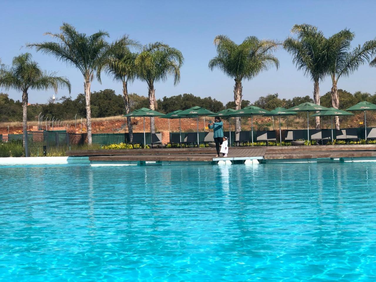 A Coastal island experience at a Large 2 bed apartment at a Crystal Lagoon Estate. — 4-Star Luxury Hotel in Pretoria, South Africa