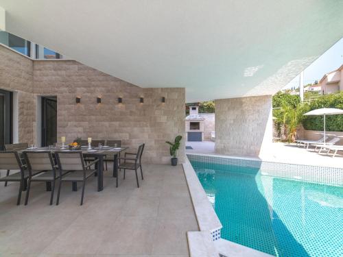 Luxury Villa Trogir 3 with private pool jacuzzi and gym by the beach on Ciovo Okrug Donji — 5-Star Luxury Hotel in Trogir, Croatia